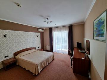 Фото номера 2-местный номер эконом Гостиница Эмеральд г. Тольятти 2